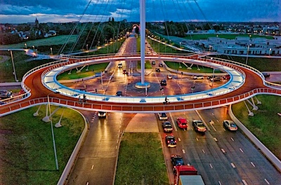 Source: http://www.reddit.com/r/pics/comments/1p97m6/the_hovenring_is_a_suspended_bicycle_path/